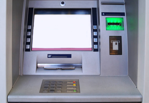 Outdoor ATM cash machine. Withdraw money from ATM machine. Bankomat at street. - Photo, image