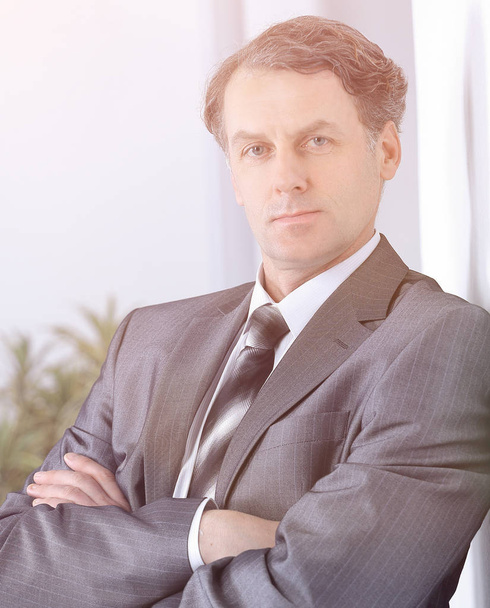 successful businessman on background of office. - Fotografie, Obrázek