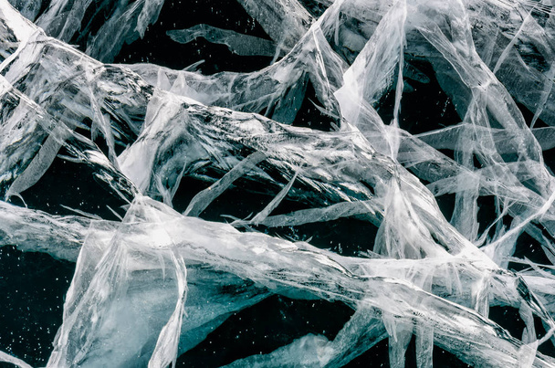 氷の表面のひびの入った表面の青 - 写真・画像