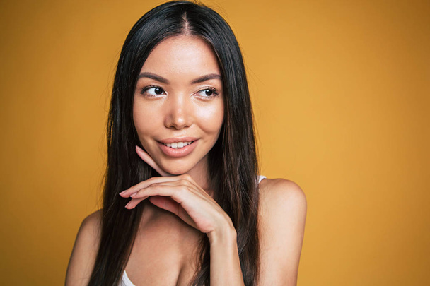 Young attractive asian woman with long hair - Fotó, kép