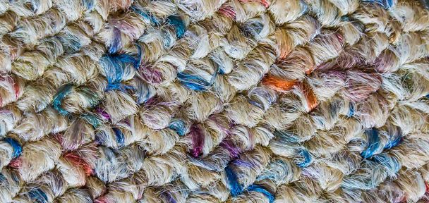 Soft wool floor fabric covering with different colors in macro close up background texture - Photo, Image
