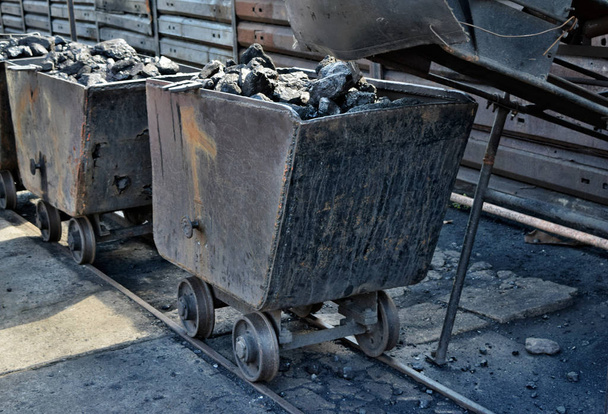 Loading and transporting coal railcars with coal in the mine - Photo, Image