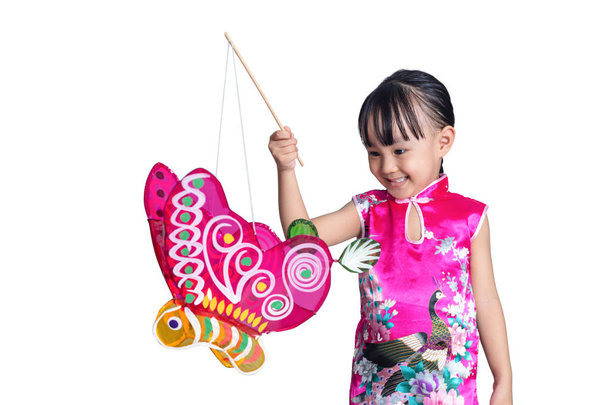Asian chinese little girl holding latern celebrate mid-autumn festival in isolated white background - Fotoğraf, Görsel