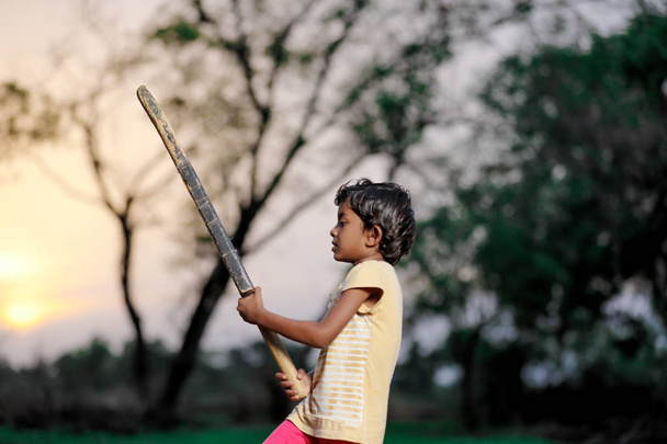 indian girl child playing cricket - Photo, Image