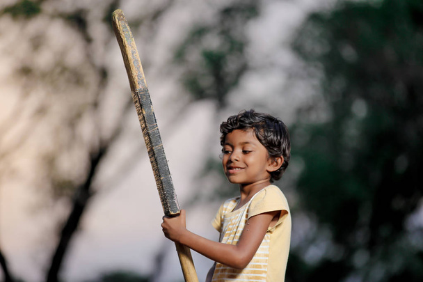 indian girl child playing cricket - Photo, Image