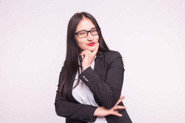 Young asian student or business lady with glasses on white background - 写真・画像