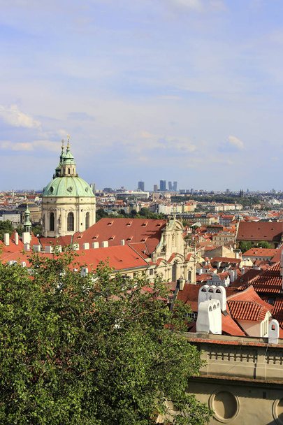 Beautiful view on Saint Nicholas church, Prague, Czech Republic - Fotó, kép