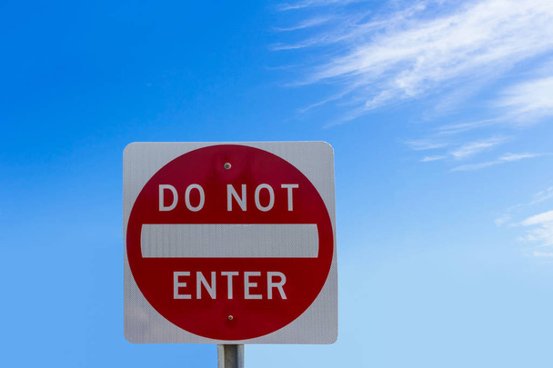 Do not enter sign on blue sky background - Photo, Image