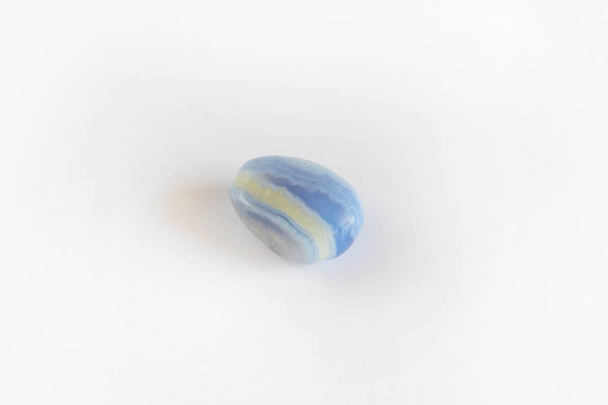 Blue Agate, sapphirine mineral gem stone isolated on white background - Photo, Image