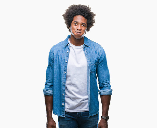 Afro american man over isolated background puffing cheeks with funny face. Mouth inflated with air, crazy expression. - Photo, image