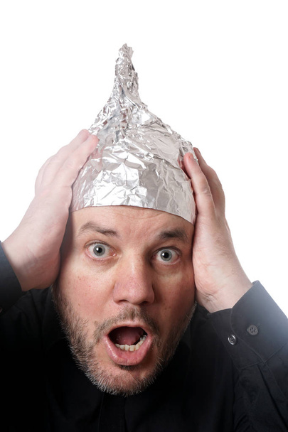 Tin Foil Hat Isolated on White Background, Symbol for Conspiracy