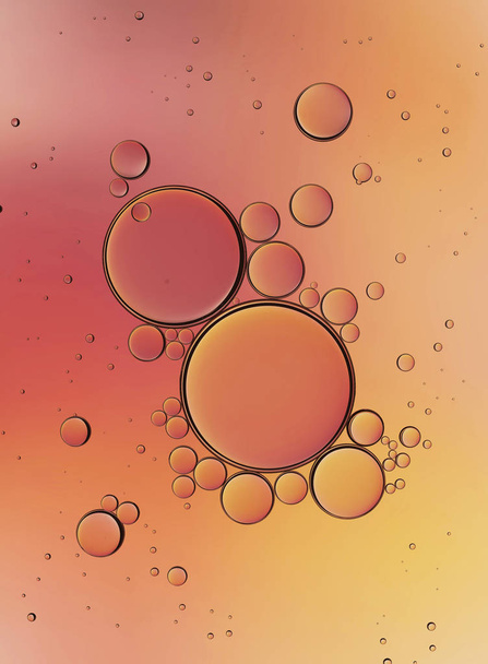 Oil Bubbles Isolated on White Background, Closeup Collagen Emulsion in Water. Illustration. Gold Serum Droplets. - 写真・画像