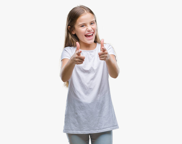 Young beautiful girl over isolated background pointing fingers to camera with happy and funny face. Good energy and vibes. - Foto, Imagen