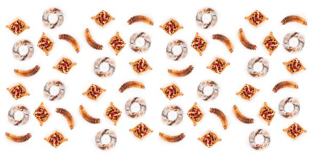 Set de deliciosos y variados pasteles aislados sobre fondo blanco, vista superior
 - Foto, Imagen