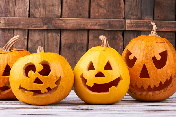 Halloween holiday pumpkins on wooden background. - Photo, image