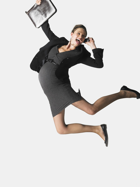Excited Pregnant Businesswoman On Call Jumping - Photo, Image