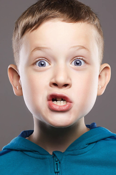 Funny child. handsome little boy. enjoy grimace emotion kid - Photo, Image