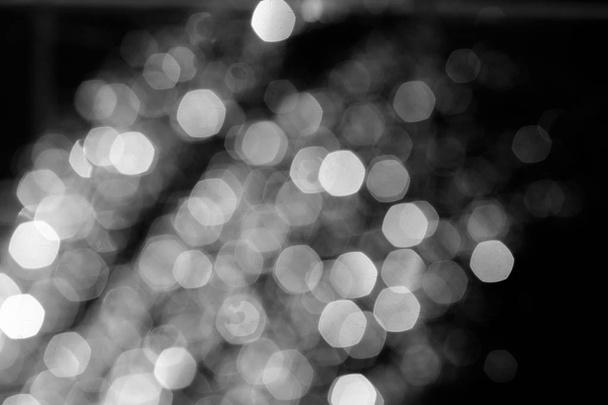 Blurry christmas lights on dark background - Fotografie, Obrázek