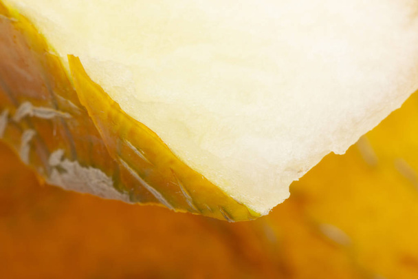 One yellow honeydew melon slice without seeds - Фото, зображення