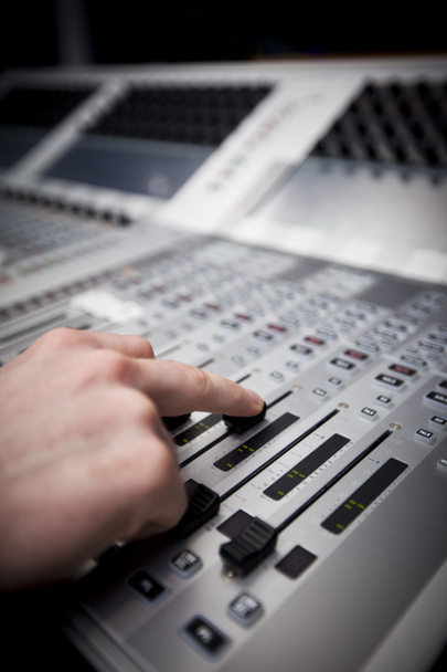 Hand on Sound Mixing desk in Television Gallery - Photo, Image