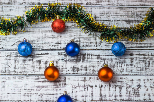 Beautiful Christmas decorations on a wooden background. Beautiful festive christmas background. New Year's holidays. Christmas Holidays. - Fotografie, Obrázek