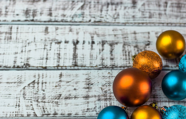 Beautiful Christmas decorations on a wooden background. Beautiful festive christmas background. New Year's holidays. Christmas Holidays. - Foto, afbeelding
