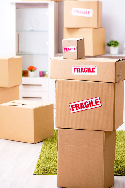 Transportation contractor with fragile boxes - Photo, Image