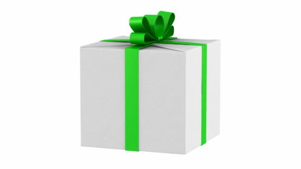 caja de regalo con cinta verde y lazo de lazo rotar sobre fondo blanco
 - Metraje, vídeo