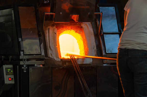 Manufacturing glass in a traditional oven, - Photo, Image