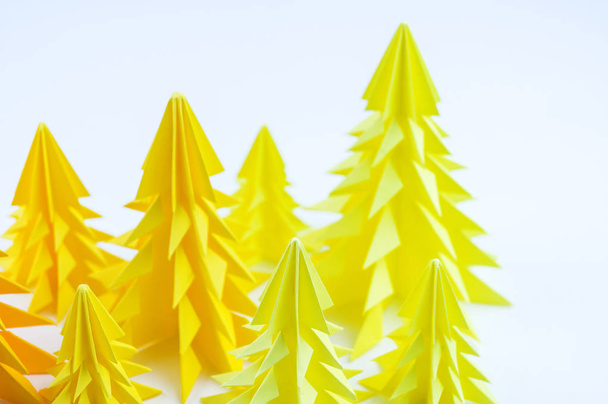 Multicolored paper Christmas tree on a white background. new Year Children's holiday. Rainbow origami - Foto, immagini