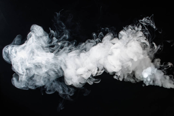 Abstract smoke on a dark background . - Photo, Image