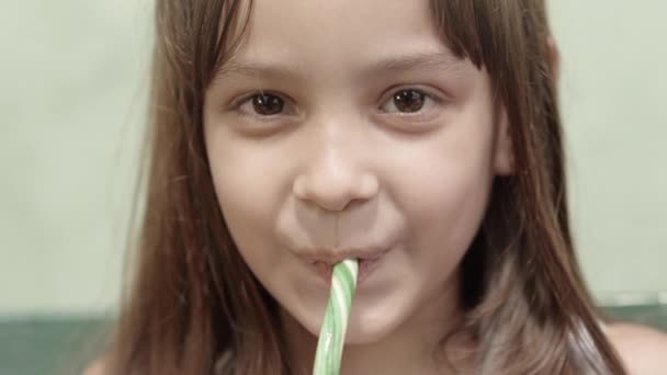 Little girl with candy - Footage, Video