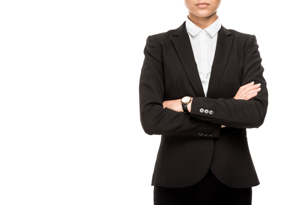 cropped shot of businesswoman in suit with crossed arms isolated on white - Foto, Bild