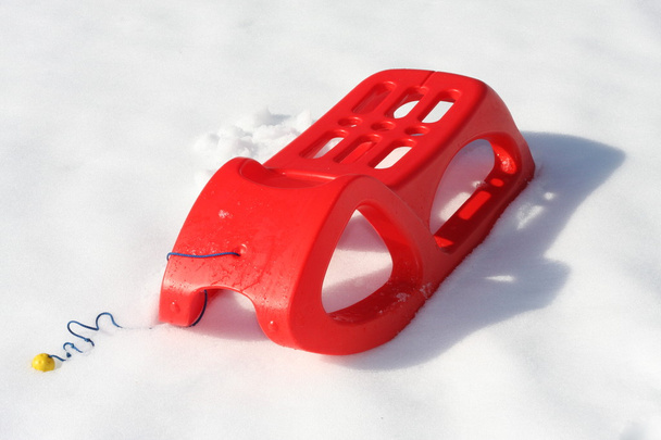 plastic slide red used to play and to descend from the mountains - Photo, Image