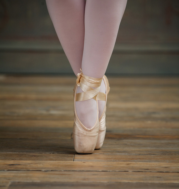 Close Up View of Ballerina Standing on Toes - 写真・画像