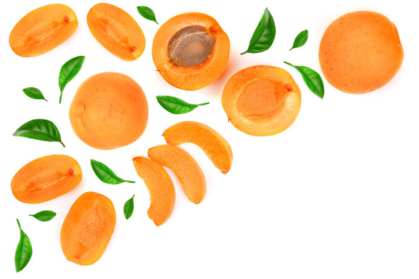 Apricot fruits with leaves isolated on white background with copy space for your text. Top view. Flat lay pattern - Photo, Image
