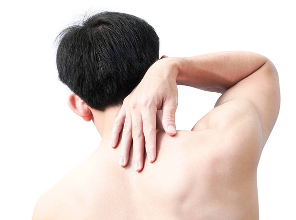 Closeup man hand holding neck or shoulder with pain on white background - Photo, Image