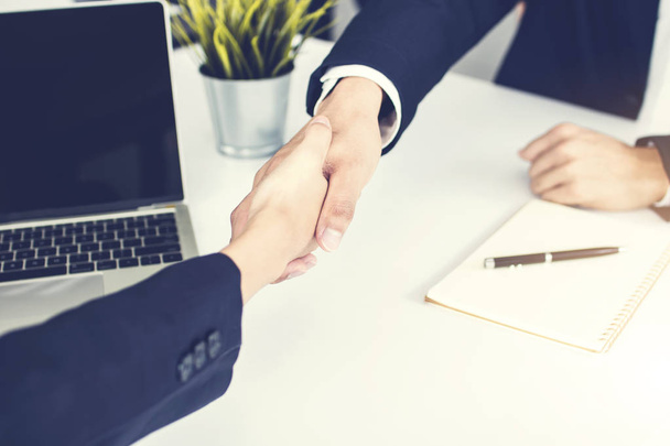 Successful negotiating business concept, Close up hand of businessmen shaking hands after finishing meeting or setting  goals and planning way to succes - Photo, Image