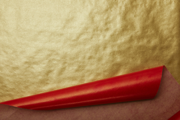 teljes méretű, piros és arany csomagoló papírok mint háttér - Fotó, kép