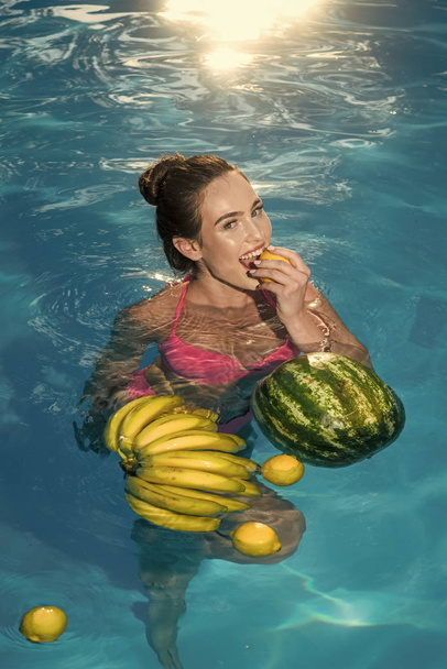 Happy woman inside swimming pool - Young girl having fun on summer holidays vacation - Travel, holidays, youth lifestyle and tropical concept - Foto, imagen