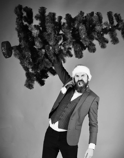 Manager with beard gets ready for Christmas. - Fotoğraf, Görsel