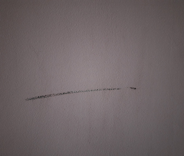μαύρη γραμμή σε γκρίζο φόντο υφής - Φωτογραφία, εικόνα