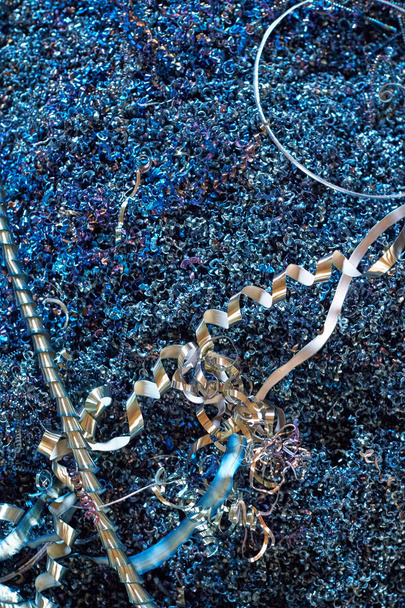 Closeup of blue metal shavings. Industrial abstract background. - 写真・画像