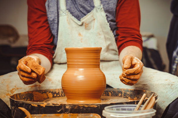Potter makes a jug - Photo, Image