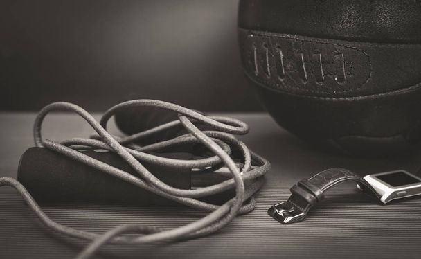 closeup photo of a skipping rope and a soccer ball - Фото, зображення