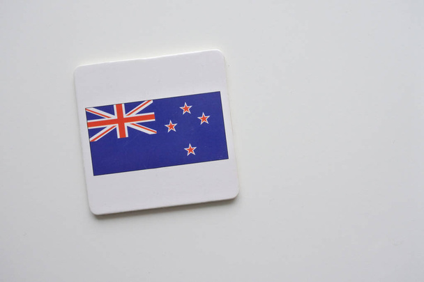 New Zealand flag on white background. copy space - Фото, изображение