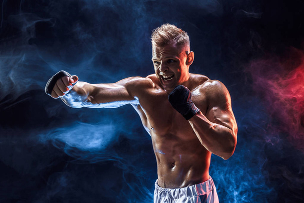 Muscular topless fighter in boxing gloves - Φωτογραφία, εικόνα