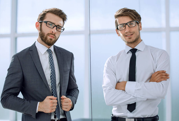 two business people standing in the office - Fotoğraf, Görsel