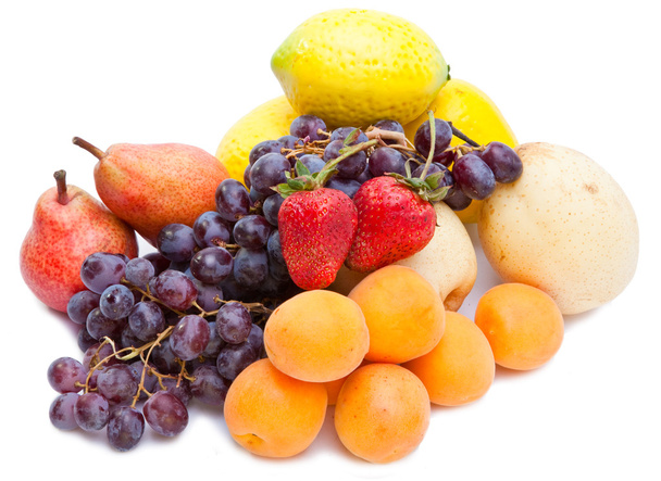 Still life of grape, lemons, pears, strawberry on white background - Photo, image