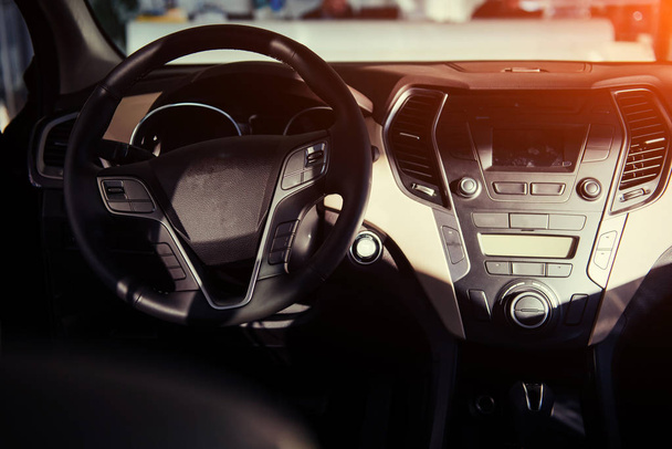 Modern car interior dashboard and steering wheel - Foto, Imagem